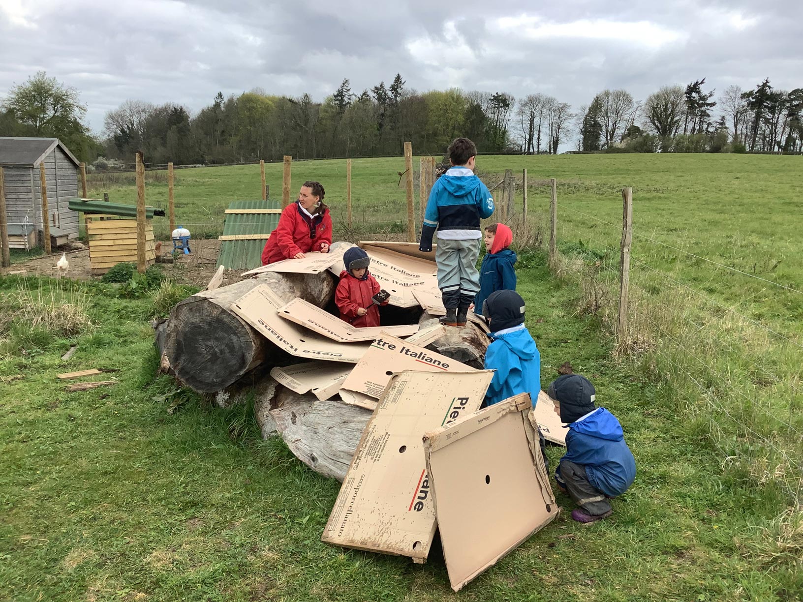 Cardboard shelter building at the Pheasant Nest